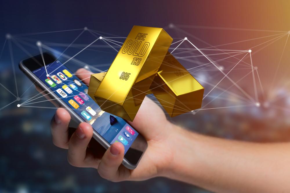 hukum emas digital dalam Islam, riba, jual beli emas, dan perbedaan ulama tentang qabdh dalam transaksi modern.( poto : bareksa.com )
