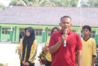 Kepala MTsN 7 Bungo, Firdaus AR, memberikan sambutan pada pembukaan Liga Madrasah 2026.(poto: jambiprima.com).